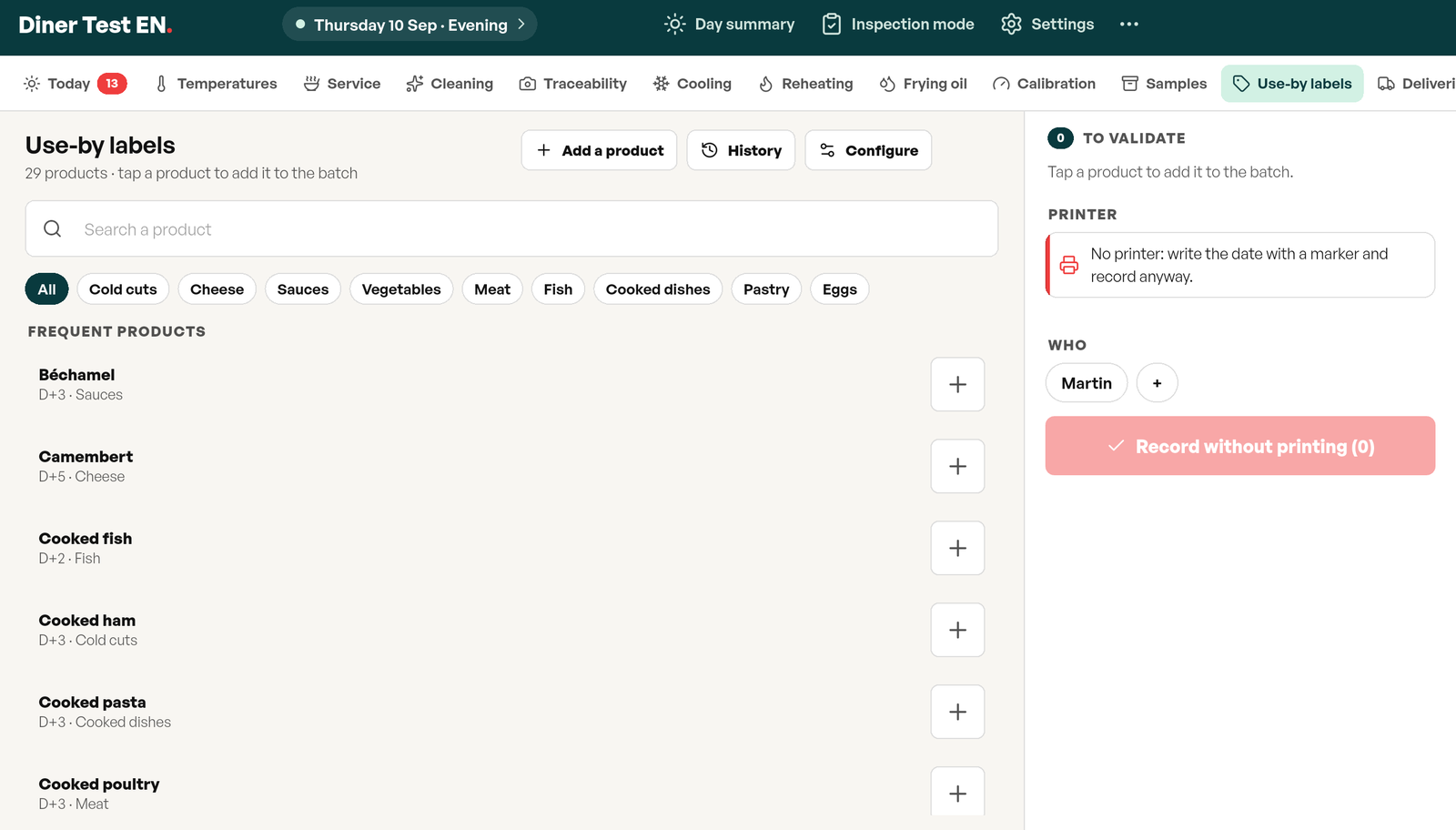 Use-by labels screen in Tracito: 29 products sorted by category with their D+1, D+3 or D+5 shelf life, a plus button per product and the “Record without printing” panel